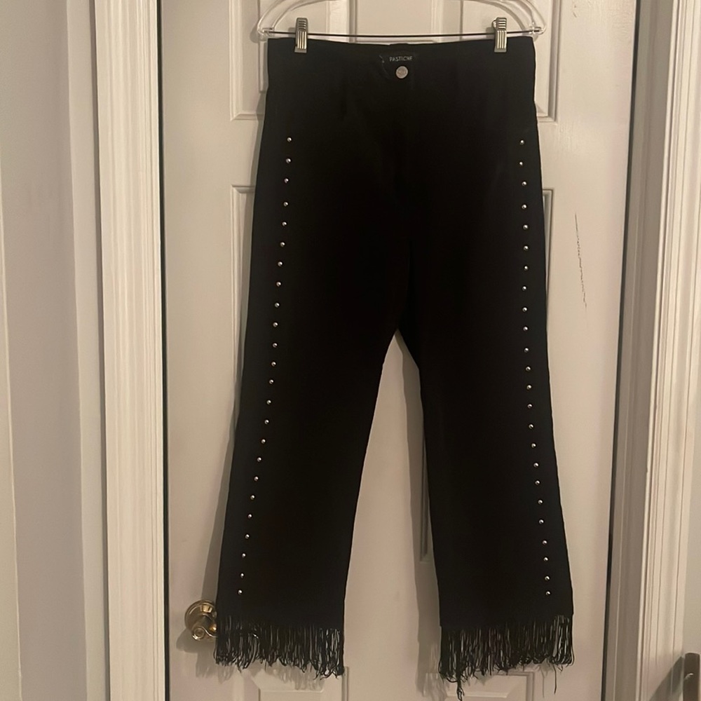 Anthropologie Pastiche studded black pants with tassel hem. Size L